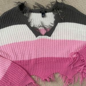 Women's destressed sweater
